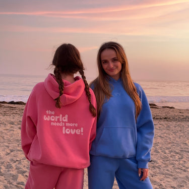 bubblegum pink "the world needs more love" ultra cozy hoodie